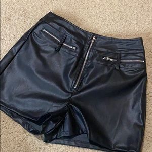 black faux leather zip shorts